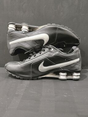 Nike Men’s Black Athletic Running Shoes with Silver Swoosh